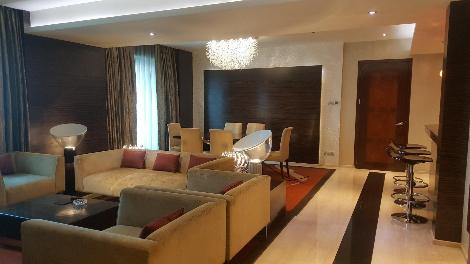Vivanta Hyderabad, Begumpet Dış mekan fotoğraf A living room in a suite at the Ritz-Carlton, DIFC