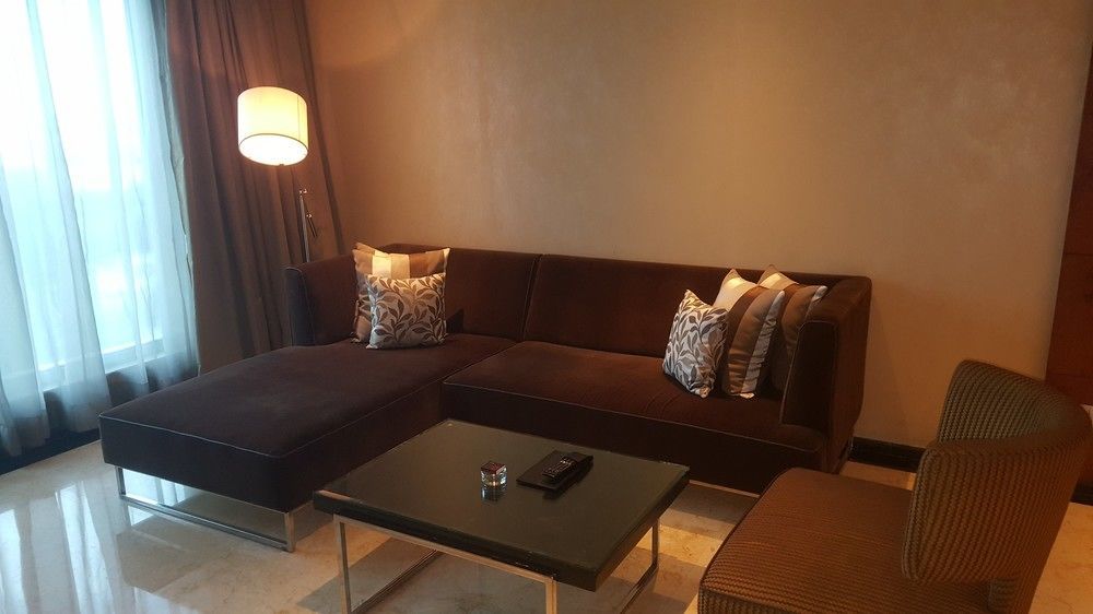 Vivanta Hyderabad, Begumpet Dış mekan fotoğraf A living room in a suite at the Ritz-Carlton, Kuala Lumpur